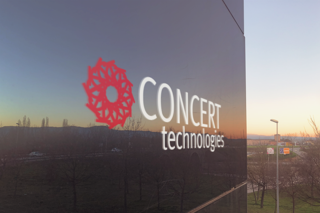 Concert Technologies logo on glass